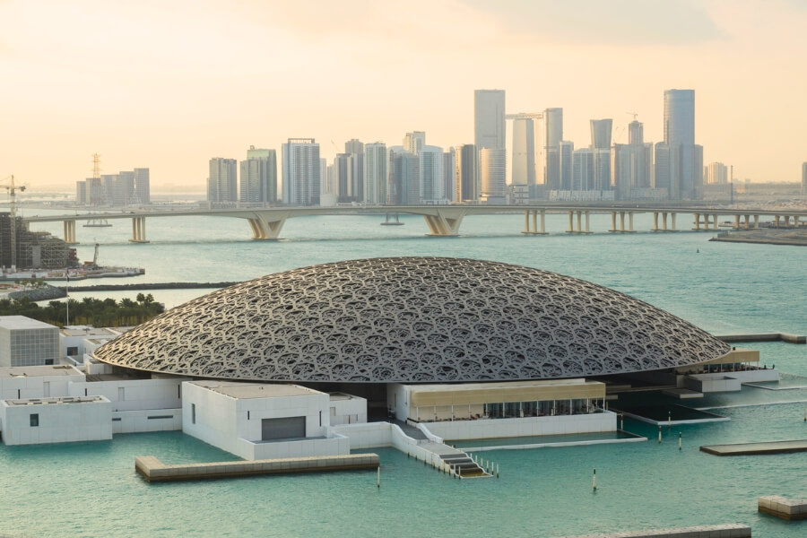 louvre Abu Dhabi looking over to the Avu Dhabi skyline